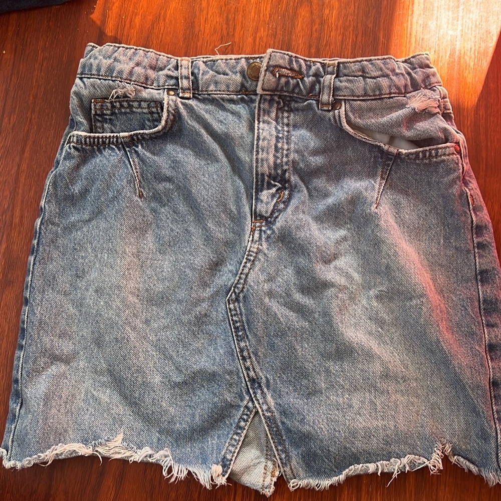 Light blue denim skirt with small split in the middle
